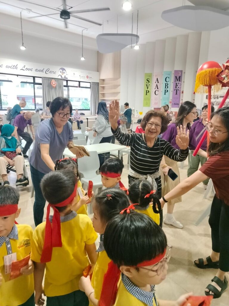 Zainab in a midst of children and dancing